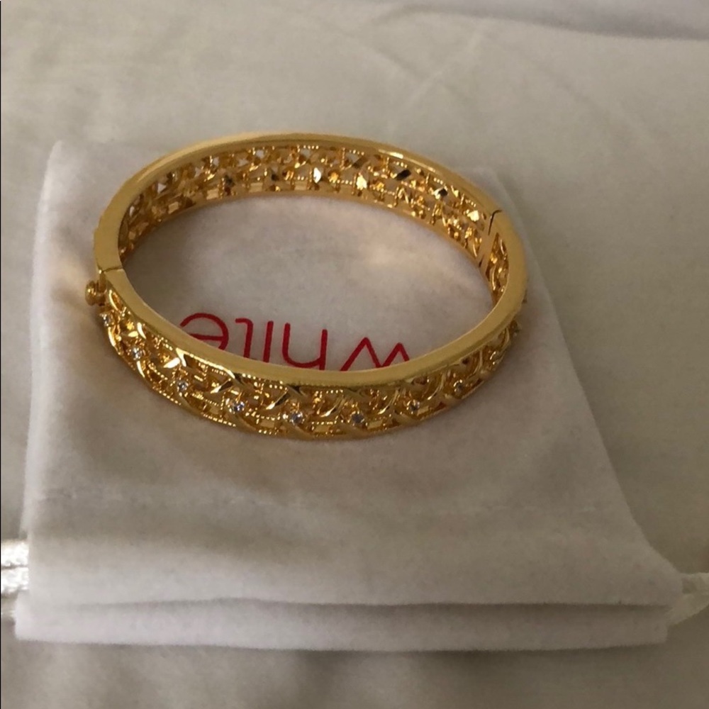 Gold bracelet by White